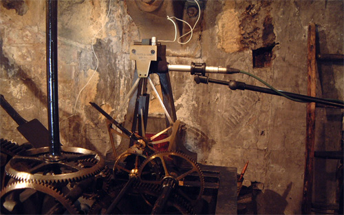 Photograph of a microphone and acceleromter installed close to the clock mechanism of Leeds Town Hall