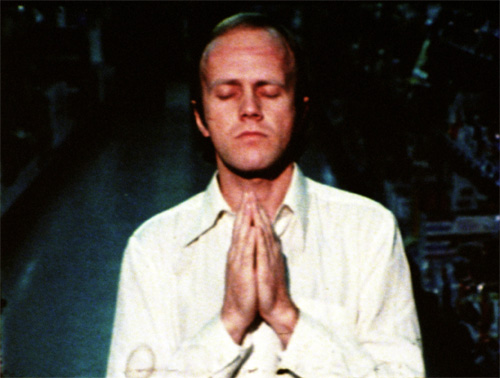 Owen Land film still: image of man praying